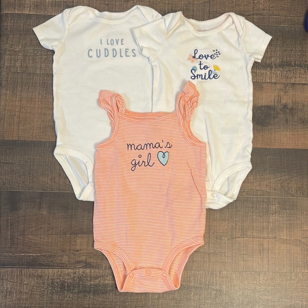 Girls size 12 months Carter’s short sleeve bodysuits